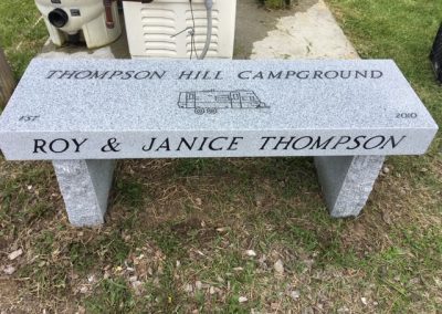 photo of bench with owners names engraved